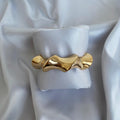 The Liquid Gold Wave Bangle